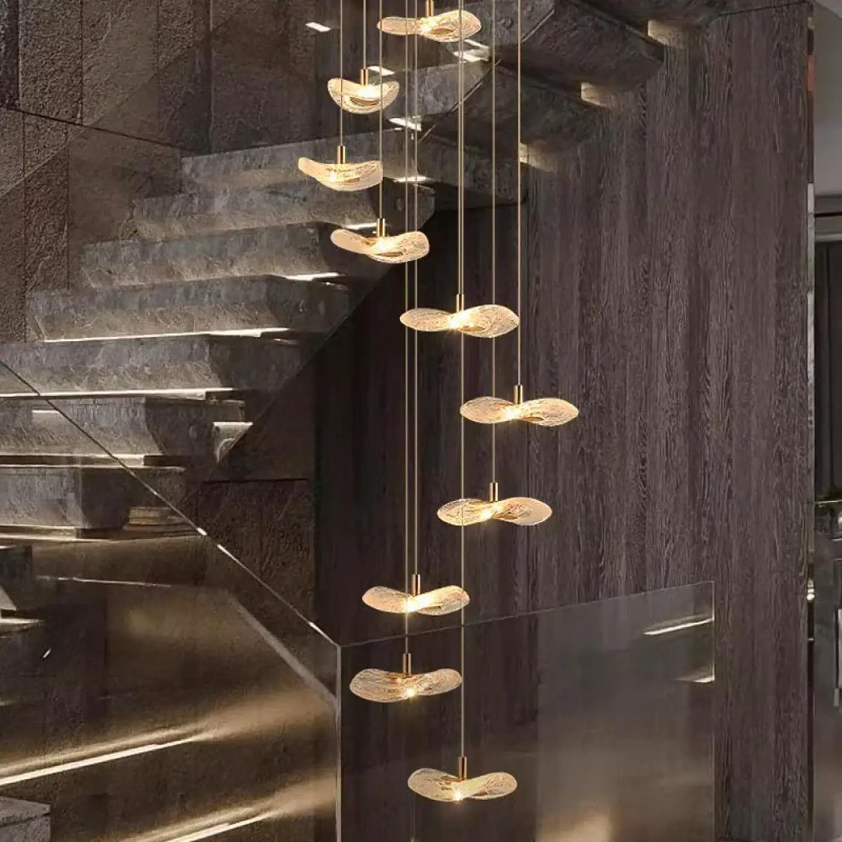 Suspension cascade escalier